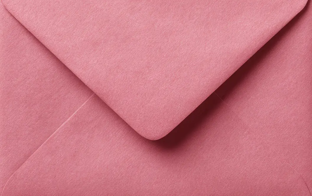 Close-up of a pink envelope for healthcare email platform setup, supporting sender-domain QA and email deliverability