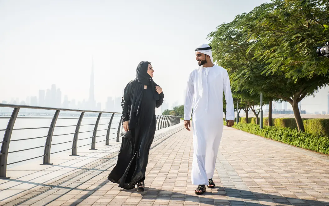 Fertility clinic marketing UAE: Couple walking beside a waterfront in the fertility clinic marketing overview, supporting IVF patient journey