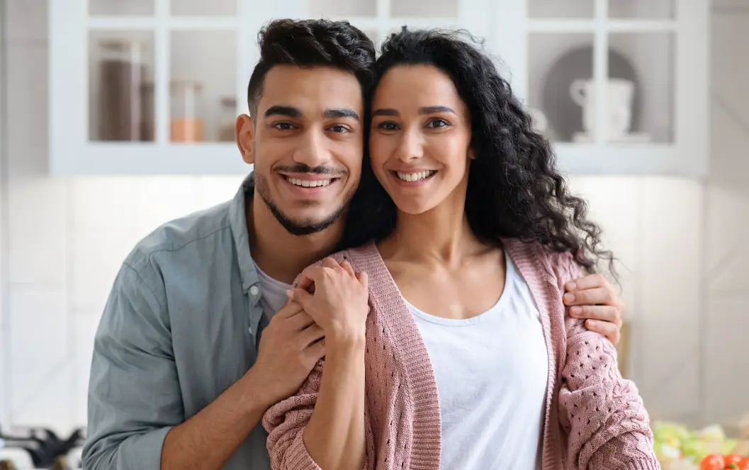 Fertility clinic SEO UAE: Couple standing together in the fertility search visibility measurement section