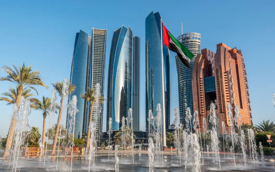UAE healthcare advertising compliance: UAE flag and waterfront towers introducing healthcare advertising compliance for Healthcare advertising can involve several layers of review