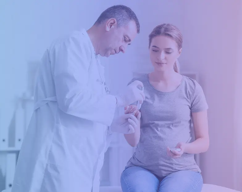 Medical and dental marketing in UAE: Clinician explaining a handheld device to a seated woman for Internal Medicine and Chronic Care, supporting specialty-led healthcare marketing