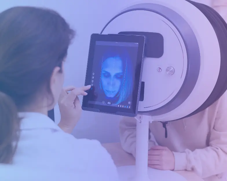 Medical and dental marketing in UAE: Facial imaging device displaying a face on a screen during an assessment for Skin Screening and Specialist Consultation, supporting aesthetic clinic marketing UAE