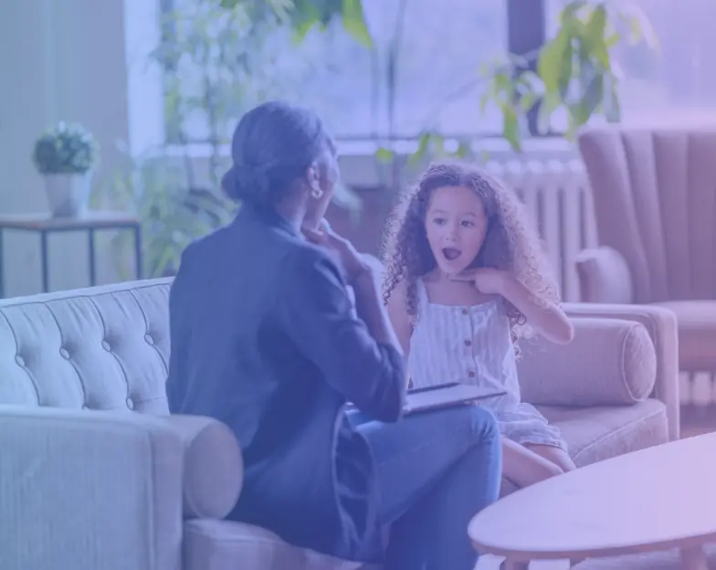 Medical and dental marketing in UAE: Adult and child practising mouth movements face to face for Speech Therapy and Related Allied Health Services, supporting specialty-led healthcare marketing