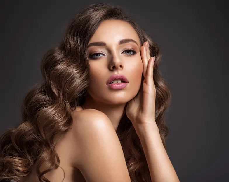 Medical and dental marketing in UAE: Beauty portrait of a woman with long styled hair for Non-Medical Aesthetic and Skin & Body Studios