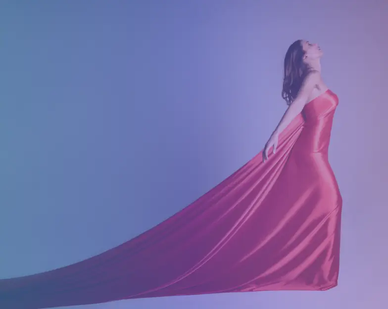 Medical and dental marketing in UAE: Woman posing in a flowing red dress for Non-Medical Body and Beauty Services