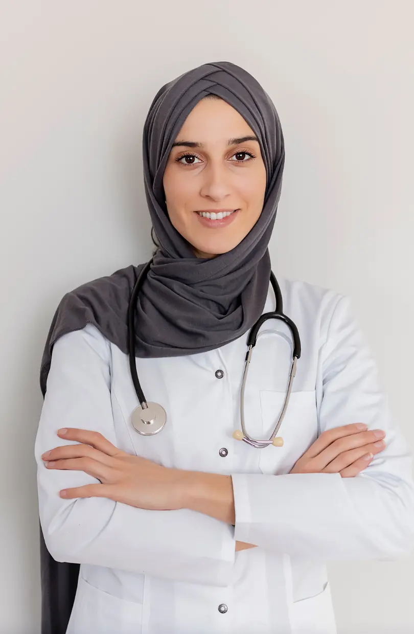 Healthcare marketing packages UAE: Clinician in a headscarf and white coat in the Value plan section, supporting paid media and patient acquisition