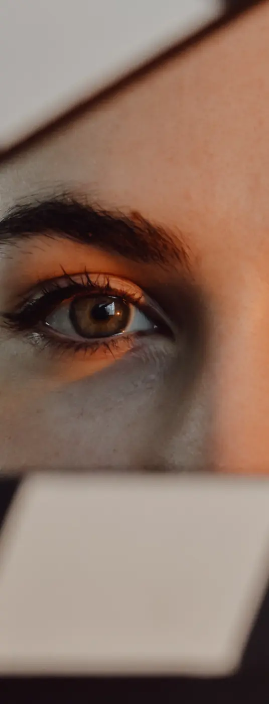 Healthcare marketing packages UAE: Close-up of a model's eye for the Signature plan creative section, supporting retention and healthcare authority